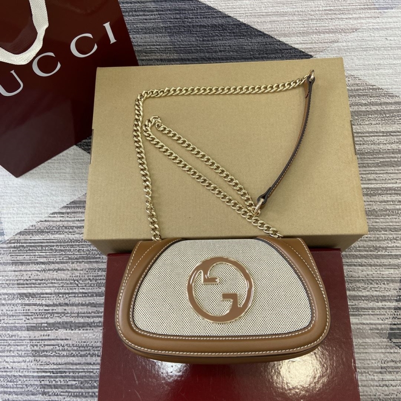 G*u*i satchel bags